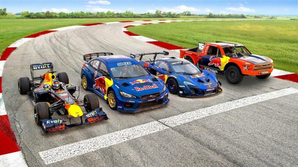 Čtveřice závodních vozů Red Bull: F1, Subaru WRX STI Rally, McLaren P1 a PRO4 Truck, připravená na speciální závod na smíšené trati. Čtveřice závodních vozů Red Bull: F1, Subaru WRX STI Rally, McLaren P1 a PRO4 Truck, připravená na speciální závod na smíšené trati.